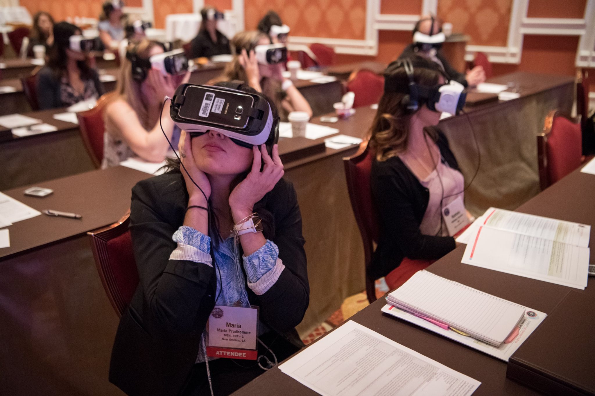 conference attendees using virtual reality headsets